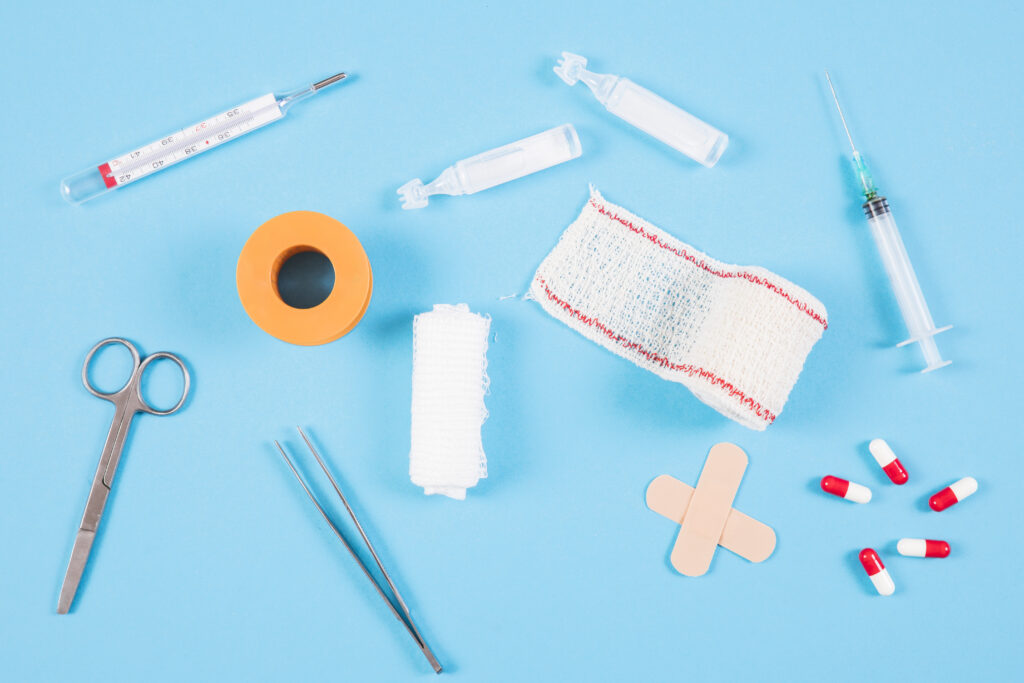 overhead-view-medical-equipments-blue-backdrop